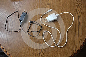 Black and white charging devices for mobile phones