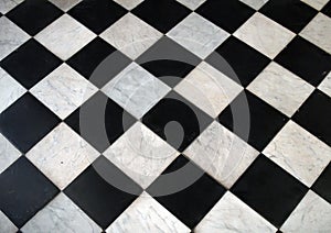 Black and white checkered marble floor pattern