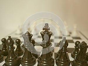 Black and white chess-Army are standing on a board, challenges planning business strategy to success concept
