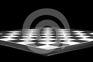 Black and white chessboard close-up, black backdrop