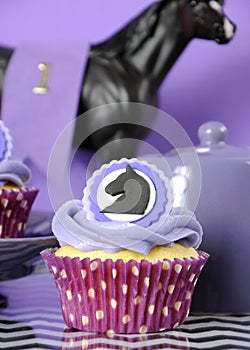 Black and white chevron with purple theme party cupcake closeup.