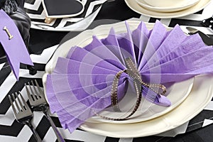 Black and white chevron with purple theme party luncheon table closeup.