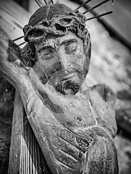 Black and white Christ statue of the Romanesque church of Erill la Vall in the Catalan Pyrenees, Spain photo