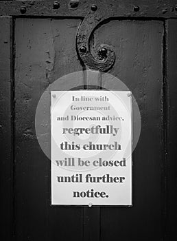 Black and white church door closed coronavirus covid pandemic