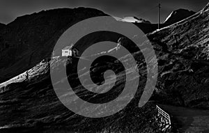 Black and white Church in Pass Pordoi in the Dolomites Sella group, Italy