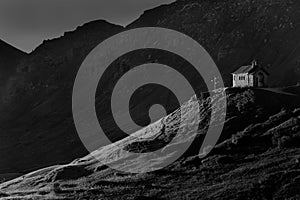 Black and white Church in Pass Pordoi in the Dolomites Sella group, Italy