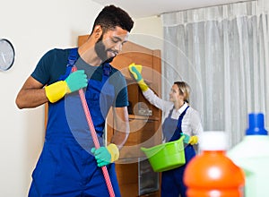 Black and white cleaners at the work