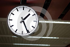 Black and white clock in trains station