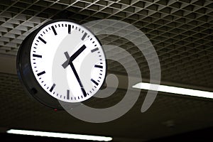 Black and white clock in trains station