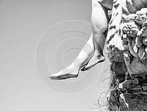 Black and white close up detail with Neptune Fountain located in Schonbrunn Palace, Vienna, Austria. Feet sculpture
