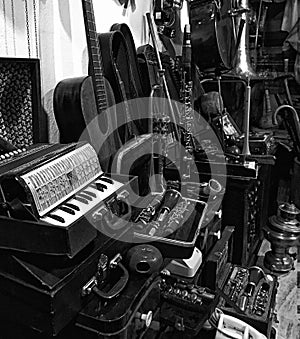 Black and white close up of musical instruments, antique shop Albania