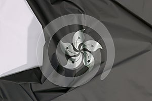 Black and white color of Hong kong fabric flag crepe and crease with white space, concept of Mourning