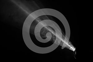 black and white color . projector beautiful spotlight . wide lens equipment for show presentation. smoke abstract background .