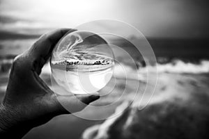 Black and White Contrast Storm Surf Captured in Glass Ball