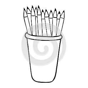 Black and white cup full of pencils