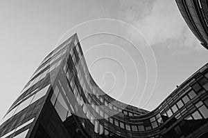Black and white curvature building exterior facade.