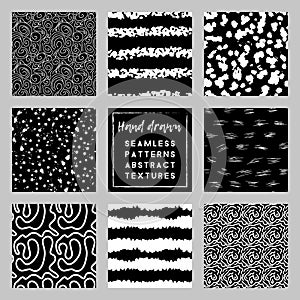 black and white doodle hand-drawn seamless patterns set with blots and strokes
