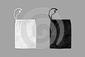 Black and white drawstring bag mockup isolated on background. Fabric cotton canvas small bag. Isolated pouch.