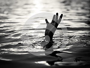 Black and white of Drowning victims, Hand of drowning man needing help.