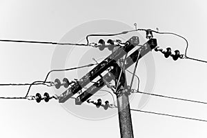 Black and white electric pole and wires
