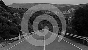 black and white empty mountain road on cyprus