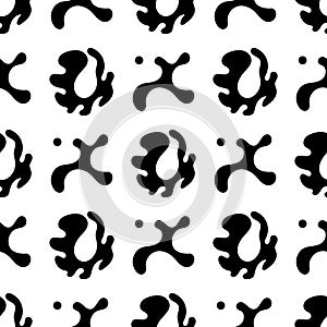 Black and white fashion prints made with a stylized x sign and blots.seamless geometric pattern with a monochrome cross