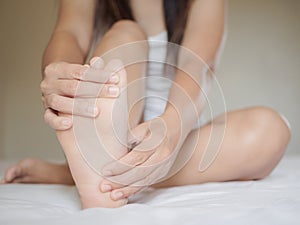 Black and white female foot pain