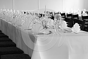 Black and white - Festive table arrangement with glasses and served and cutlery