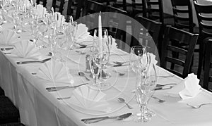 Black and white - Festive table arrangement with glasses and served and cutlery