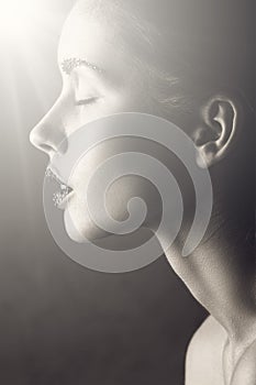 Black and white glamour woman portrait. light on clean face