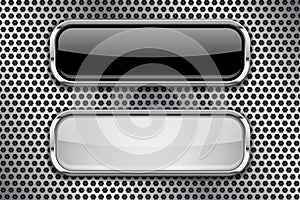 Black and white glass buttons with metal frame, on perforated background