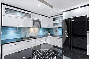 Black and white gloss kitchen