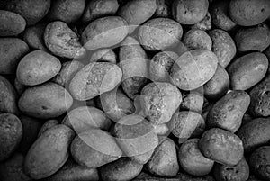 Black and white gravel pebble grit coarse sand background