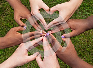 Black and white hands in heart shape, interracial friendship concept