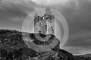 A Black and White High Contrast Image of The Crumbling Ancient Ruins of Greenan Castle looking over From Greenan Bay in Ayrshire