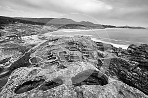 Black and white history told by rocks and stone