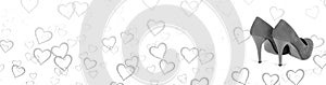 Black and white horizontal banner. Hearts background with a pair of woman shoes