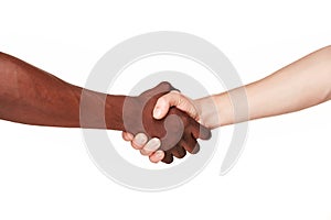 Black and white human hands in a modern handshake