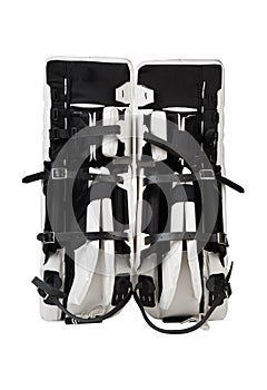Black and white ice hockey goalie protective leg pads isolated on white background