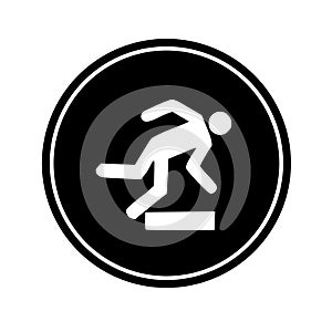 black and white icon of person stumbling