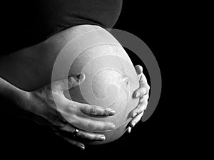 Black and white image of a 36 weeks pregnant woman