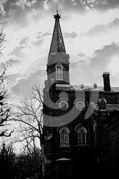 The black-white image captures the image of an old Lutheran city church. The monochrome aesthetic emphasizes the architectural