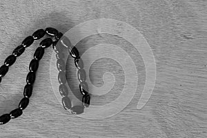 Black and white image of Islamic prayer beads