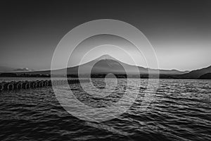 Black and white image of Mt. Fuji over Lake Kawaguchiko at sunset in Fujikawaguchiko, Japan