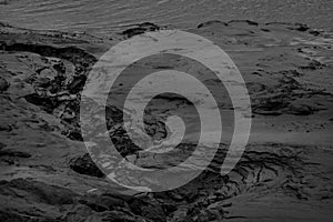 Black and white image of mudflats