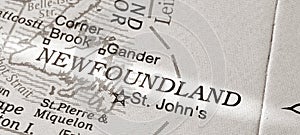 Black and white image of Newfoundland on a globe