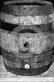 Black and white image of old wine barrel