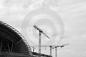 Black and white image of scaffolding in the high altitude, scaffolding formed a myriad of grid, industrial and modern urban