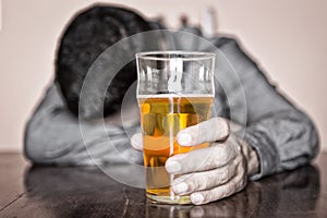 Black and white image of a sleeping drunk man