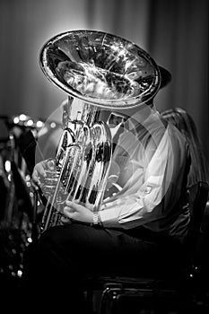 Tuba player in black and white